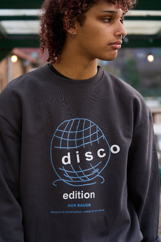 Model in DISCO ED. Heavyweight Sweater, Disco ball Graphic Sweat Streetwear by Hun Sauce. Now stocked at AMF record store in London.