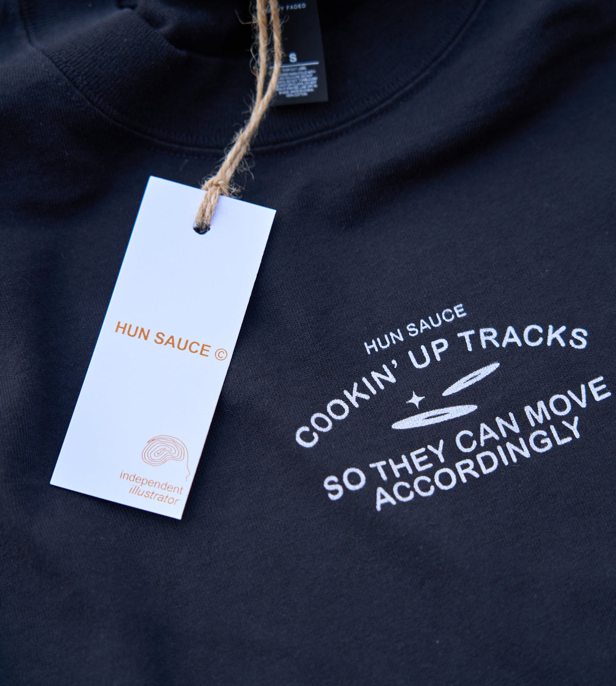 close up CHEF DE PARTY Heavyweight T-Shirt, Cartoon Graphic Tee, in black, Hun Sauce. Now Available at All My Friends Hackney Wick, record store