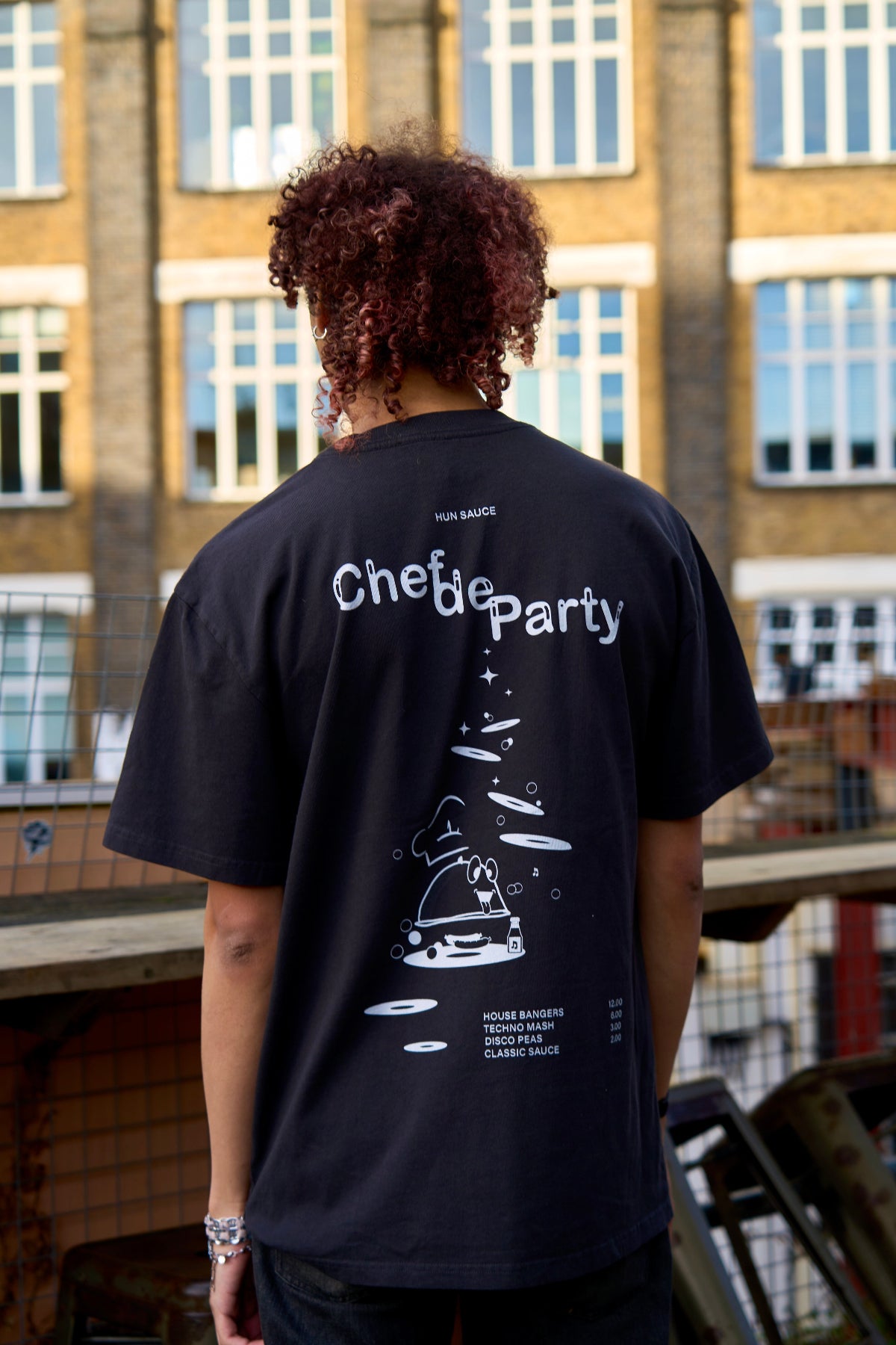 CHEF DE PARTY Heavyweight T-Shirt, Cartoon Graphic Tee, in black, Hun Sauce. Now Available at All My Friends Hackney Wick, record store