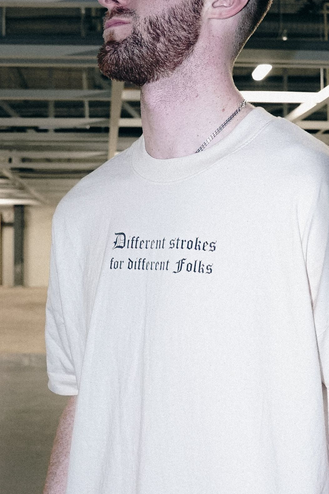 Drumsheds, London new nightclub in Hun Sauce, close up of DIFFERENT FOLKS Heavy Weight Drop Shoulder Oversized T-Shirt