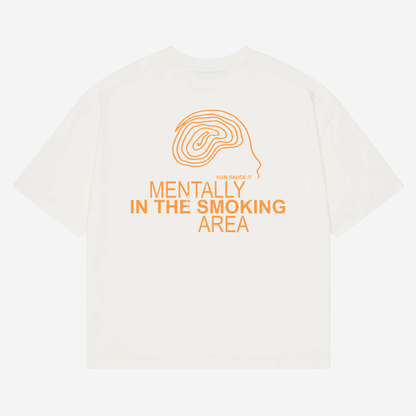 SMOKING AREA Heavyweight T-Shirt, A heavyweight white tee for the outside people making friends. Features bold orange graphics and a hand-drawn doodle head. Oversized fit, made for low lighting, loud music and deep chats.