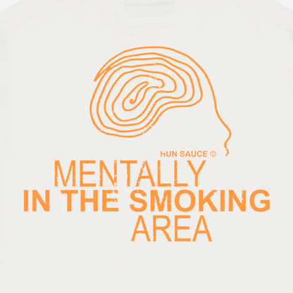SMOKING AREA Heavyweight T-Shirt, A heavyweight white tee for the outside people making friends. Features bold orange graphics and a hand-drawn doodle head. Oversized fit, made for low lighting, loud music and deep chats.