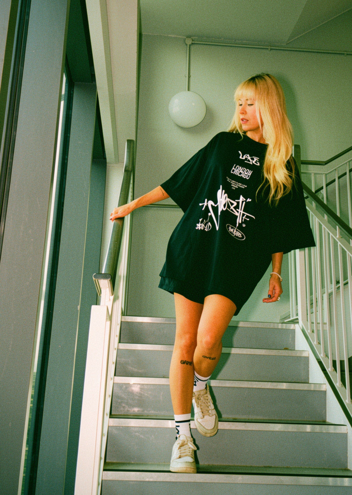 DJ Shosh in the SHOSH x Hun Sauce Heavyweight T-Shirt Created in collaboration with DJ and producer SHOSH, this limited edition heavyweight tee brings together a shared love of music A hand-drawn graffiti-style graphic 